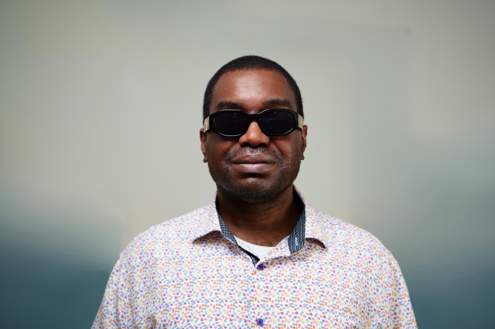 Kevin E. Cartwright smiling in a professional portrait for Cartwright Accessibility Solutions contact information.